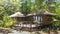 Small bungalow in the middle of the nature.Tree plantation exotic paradise