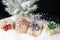 Small burlap wrapped Christmas tree with simple gifts wrapped in