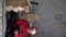 small business owner Santa Claus in a hat works in in home office of an online store prepares goods in boxes for