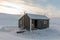 The small cabin known as the emergency hut at Villa Fredheim, cabin in Tempelfjorden, Svalbard.