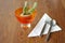 Small Cactus with silverware on Wood Table