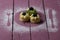 Small cakes on the pink wood table