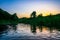 Small calm summer evening lake