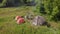 A small camp in the fields. Tourists stopped in a beautiful natural place with three tents, cook food and go away.