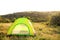 Small camping tent in wilderness