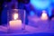 Small candlelight that have yellow spots on purple light and white background in the room of party of celebration