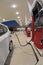 Small Car Refueling At Gasoline Station Convenience Store Revised