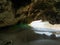 Small cave in Tsigrado beach in Milos Island