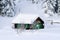 Small chalet in the snow of the dolomites