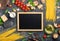 Small Chalk board with variety ingredients for cooking Italian p