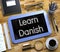 Small Chalkboard with Learn Danish Concept. 3D.