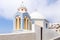 Small chapel in beautiful pastel colors near Fira, Santorini, Greece