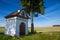 Small chapel roadside shrine next to the road.