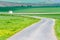 Small chapel in spectacular green wavy moravian fields and highl