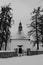 Small Chapel in winter landscape.