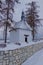 Small Chapel in winter landscape.