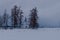 Small Chapel in winter landscape.