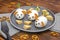 Small chicken eggs mouse,mice with ears of carrot,cheese on plate,creative, fun food,healthy lunch snack idea for kids party. Menu