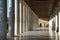 small child crawls in a building with Doric columns, Stoa Attalou, Athens