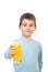 Small child offering orange juice