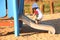 A small child plays in the playground