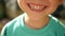 A small child shows emotions: laughter, happiness, joy, smile. Close-up of a child`s mouth. A child demonstrates teeth.