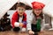 Small children dress up like pirates playing together indoors