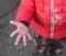 small children& x27;s dirty hands arms outstretched to the top on the asphalt background