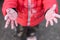 small children& x27;s dirty hands arms outstretched to the top on the asphalt background