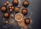 Small chocolate petit fours with hazelnuts top view