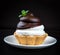 Small chocolate tarts tartlets with whipped mascarpone cheese