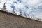 Small chortens/stupas/pagodas on the circular wall of Samye, Tibet