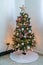 Small Christmas Tree with Pink Gold and Yellow Ornaments
