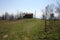 Small church abandoned, in disuse, on the Apuan Alps of the Tuscan Apennines in a clearing on a sunny spring day