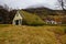 Small church cover with grass on roof