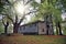 Small church surrounded with trees