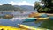 Small colored Nepalese boats for tourists on Lake Begnas near Pokhara in the Nepali Himalayas