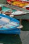 Small colorful fisherman boats park at the pier in Manarola town, Cinque terre, Italy