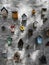 Small colorful wooden bird houses on the white wall