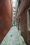 Small colourful venetian street in a popular neighbourhood