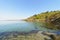 A small cove on the River Dwyryd estuary under a blue spring sky