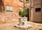Small, cozy courtyard with colorful cottage / Venice in Italy / The small yard with bright walls of houses