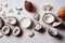 Small cracked coconut fruit lying on white background