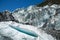 Small crevasse below seracs of an icefall on the Fox Glacier in