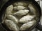 Small crucian carp in flour fried in a pan