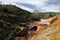 Small dam on a sulfur and iron polluted river