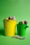 Small decorative buckets filled quail eggs on the green background