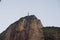 Small and distante chist the redeemer statue in corcovado mounta