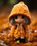 a small doll wearing an orange coat on the ground