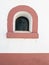small domed window on the facade of the bullring in the village of Coruche.